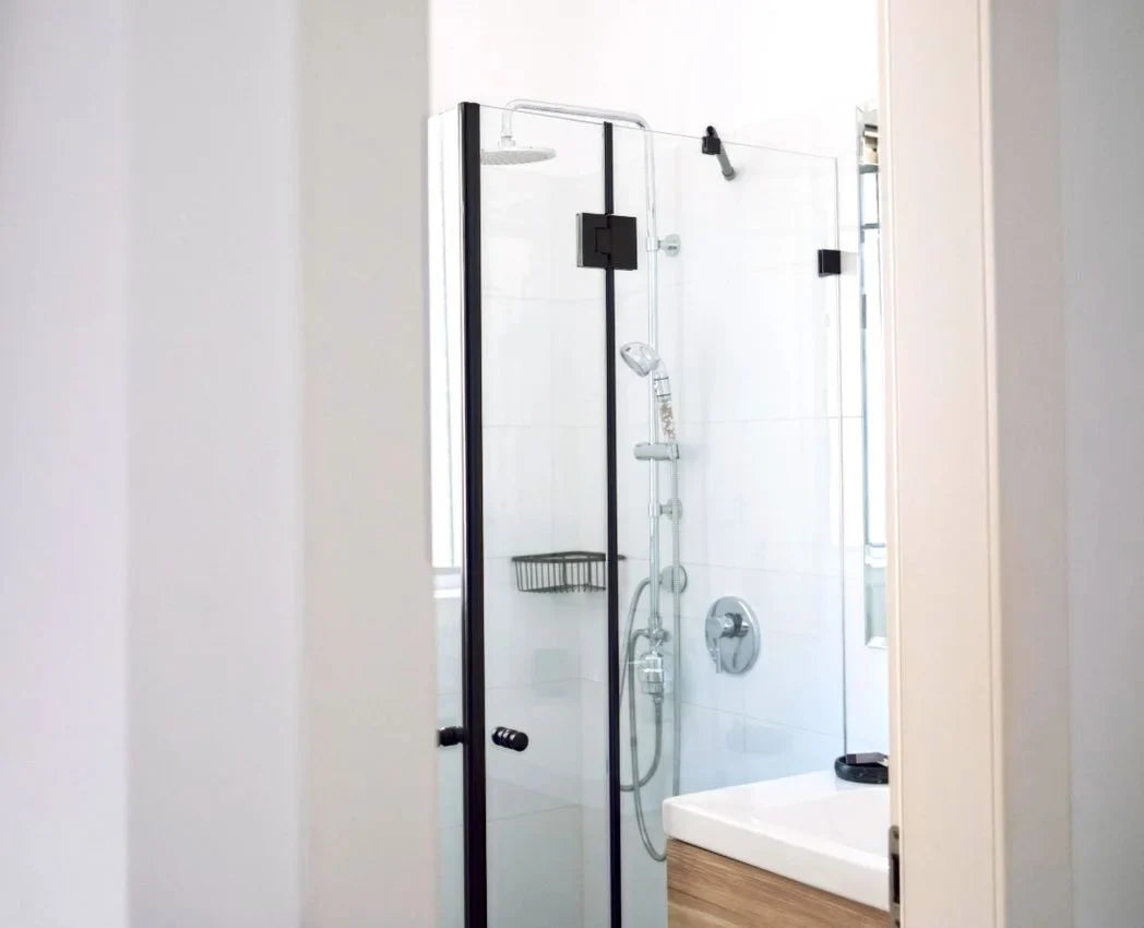 Clean glass shower doors and enclosure free of water spots and soap scum